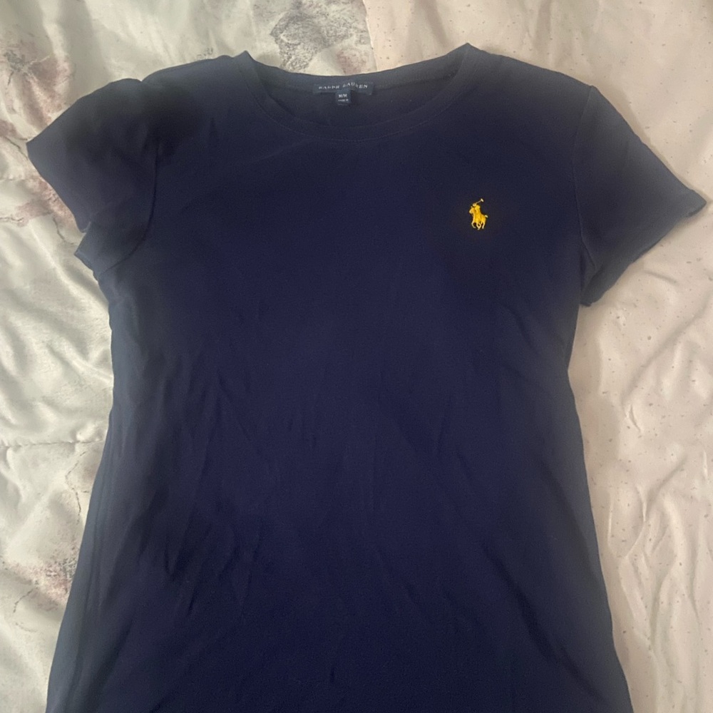 navy blue and yellow polo shirt